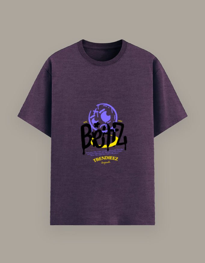 Purple t-shirt with graphic design and text on a gray background