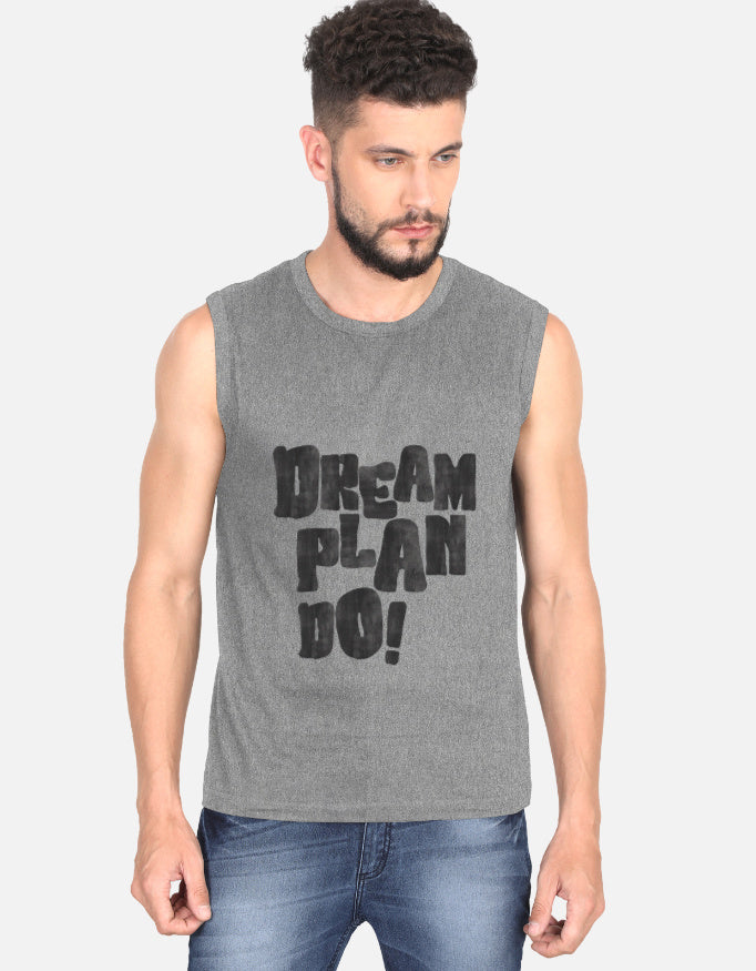 Man wearing a gray sleeveless shirt with 'Dream Plan Do!' text on a white background