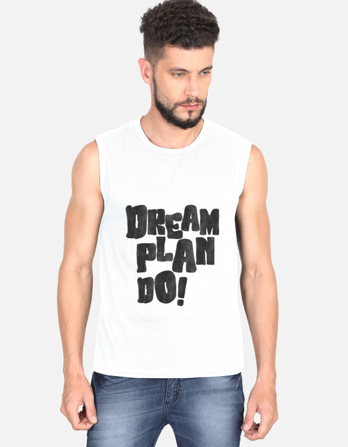 Man wearing a sleeveless shirt with 'Dream Plan Do!' text on a plain background