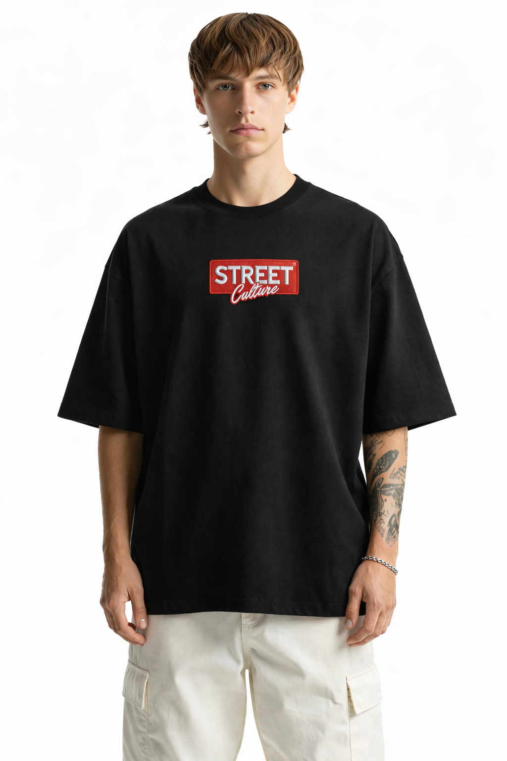 Person wearing a black t-shirt with a red and white logo on a white background