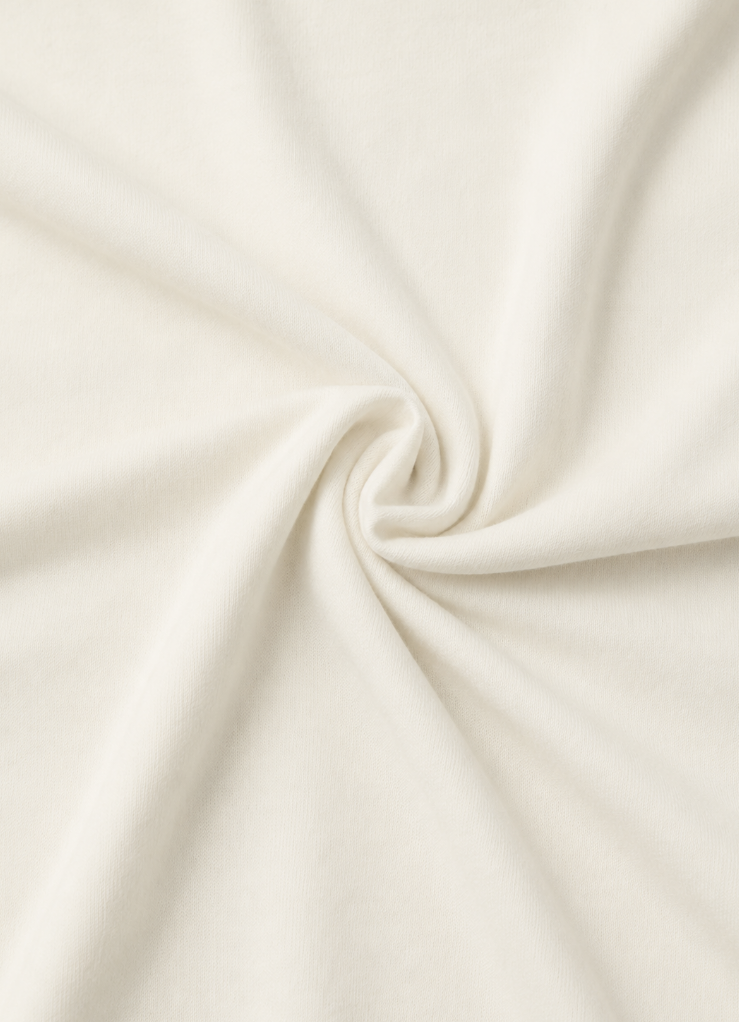 Close-up of beige fabric with folds
